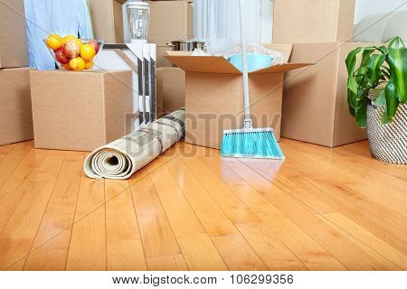 Moving boxes in new apartment. Real estate concept.