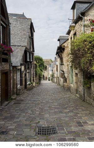 Medieval Cobbled Street In Dinan, Brittany, France