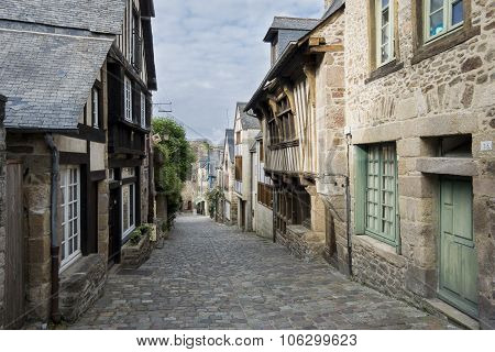 Medieval Cobbled Street In Dinan, Brittany, France