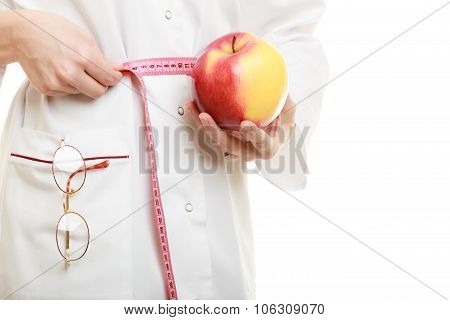 Doctor Specialist Holding Fruit Apple Measuring Waist