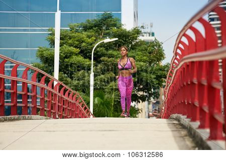 Woman Running And Working Out At Morning In The City