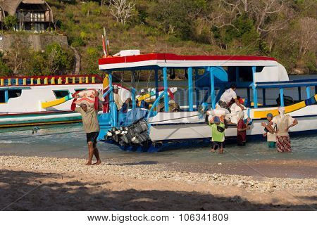 Men Transports Cargo From Ship