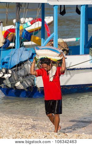 Men Transports Cargo From Ship