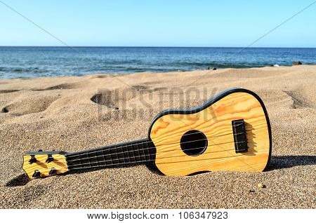 Guitar on the Sand Beach