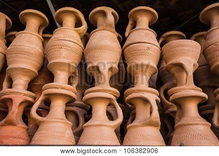 Eastern Pitchers Stand On A Shelf
