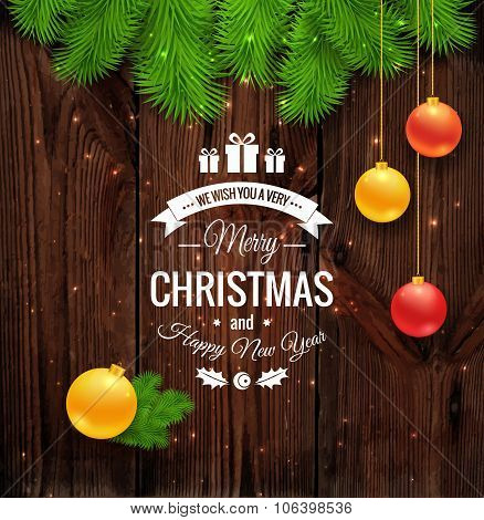 Merry Christmas greetings logo on wood.