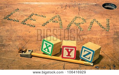 Vintage School Desk With Composition Of Pencil Penknife And Baby Cubes Letters - Concept Of Studying