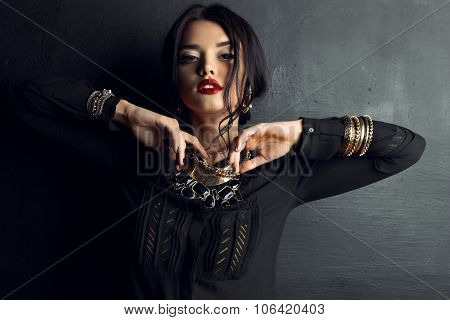Gorgeous Woman With Dark Hair And Bright Makeup With Luxurious Bijou