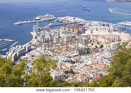 view of the city below, the ocean and the beach from the height of the Rock of Gibraltar