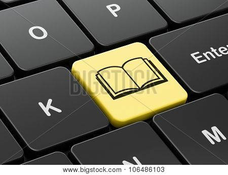 Science concept: Book on computer keyboard background