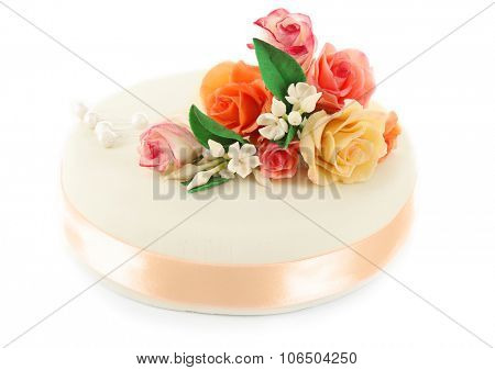Cake with sugar paste flowers, isolated on white