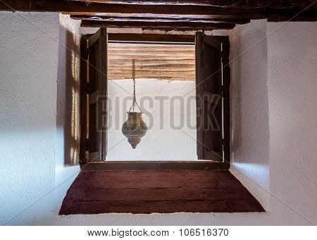 Worn Wooden Shutters On Window Of Old Home