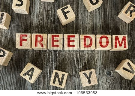 Wooden Blocks with the text: Freedom