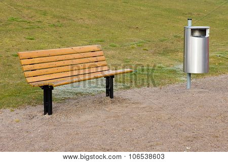 Bench and trash can