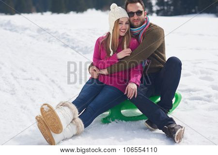 romantic winter  scene, happy young couple having fun on fresh show on winter vacatio, mountain nature landscape