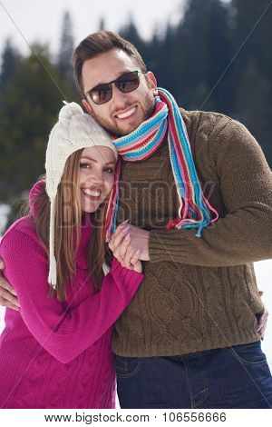 portrait of happy young romantic tourist  couple outdoor in nature at winter vacation