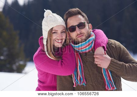 portrait of happy young romantic tourist  couple outdoor in nature at winter vacation