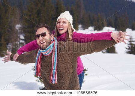 portrait of happy young romantic tourist  couple outdoor in nature at winter vacation