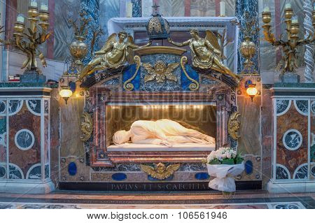 Rome, Italy - October 2015 - Marble Statue Of St Cecilia On Her Tomb Under The Altar In The Basilica