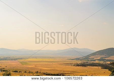 Rural Landscape With Late Afternoon Sky And Farmland