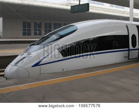Chinese bullet train side view on Tianjin platform