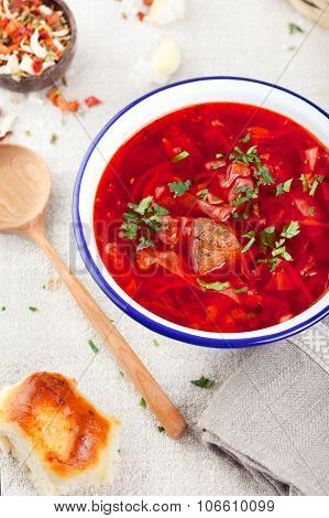 Traditional Ukrainian Russian vegetable soup, borsch with garlic donuts, pampushki.