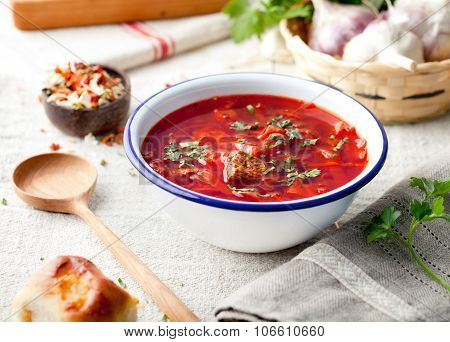 Traditional Ukrainian Russian vegetable soup, borsch with garlic donuts, pampushki.