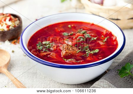 Traditional Ukrainian Russian vegetable soup, borsch with garlic donuts, pampushki.