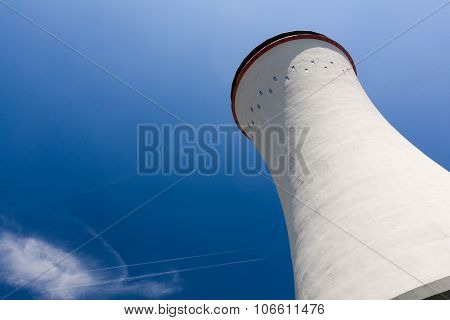 Cooling Tower Against A Blue  Sky