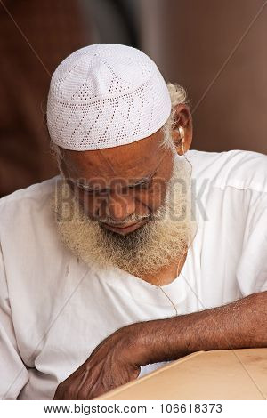 Little India, Singapore-2008. Portarait Of An Unknown Old Hindu Man Sleeping At The Cafe Table
