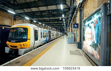 LONDON, UK - SEP 27: Kings Cross railway station interior on September 27, 2013 in London, UK. Opened in 1852, it is the southern terminus of the East Coast Main Line.
