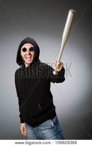 Aggressive man with basebal bat 