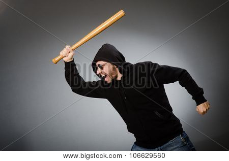 Aggressive man with basebal bat 