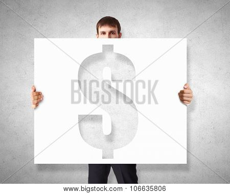 Businessman holding banner with drawn money earning concept