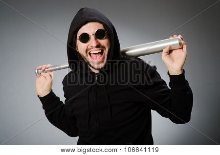 Aggressive man with basebal bat 