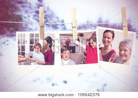 Photos hanging on a line against snow covered landscape