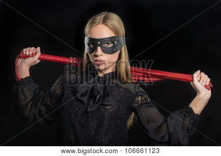 girl with red leather whip and mask BDSM