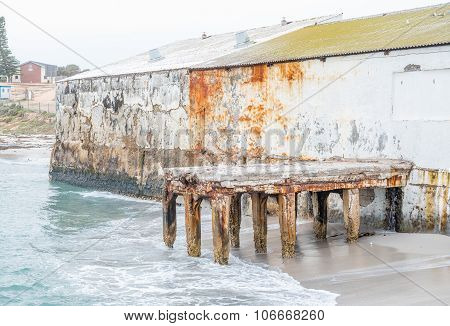 Old Building At The Harbor In Doornbaai