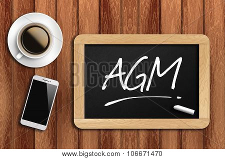 Coffee, Phone  And Chalkboard With  Word Agm