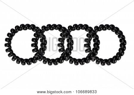 Four black plastic spring scrunchy