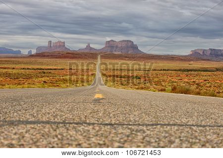 Lost On An Empty Road In Monument Valley