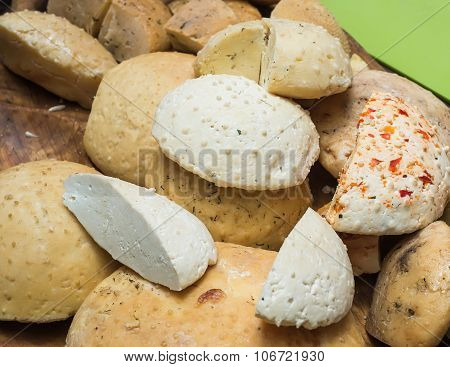Different sorts of Hungarian homemade cheese at a Sunday farmer's market