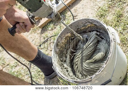 Mixing Cement Solution Using Electric Drills