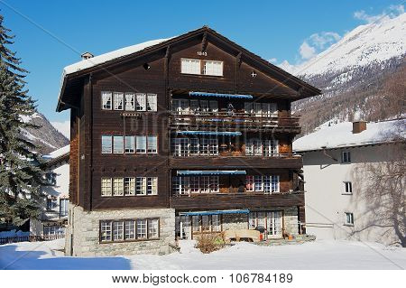Exterior of the traditional wooden chalet in Zermatt, Switzerland.
