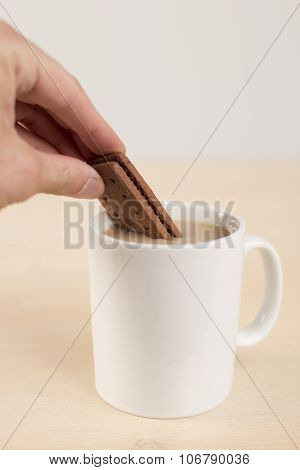 Dunking Buscuit In Tea