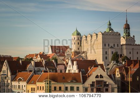 White castle and red roofs of residential houses in Szczecin, Poland