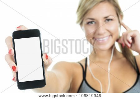 Fit woman stretching her leg to warm up - isolated over white ba