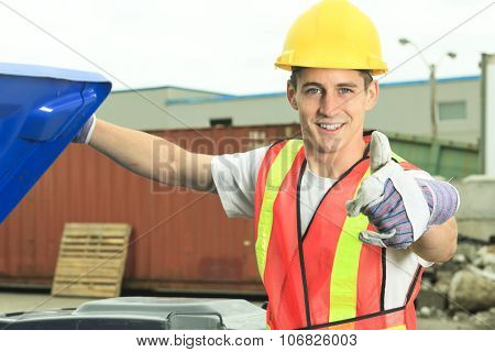 A worker who recycling thing on recycle center