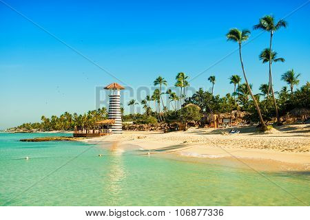 Paradise Tropical Island In Dominican Republic. White Sand, Blue Sea, Clear Sky And  Lighthouse On S