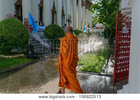 Thai Monk Walking In Temple To Worship